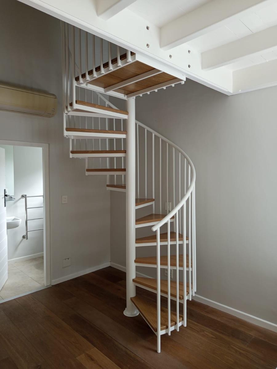 Powder-coated white steel spiral staircase with oak treads, Cape Town