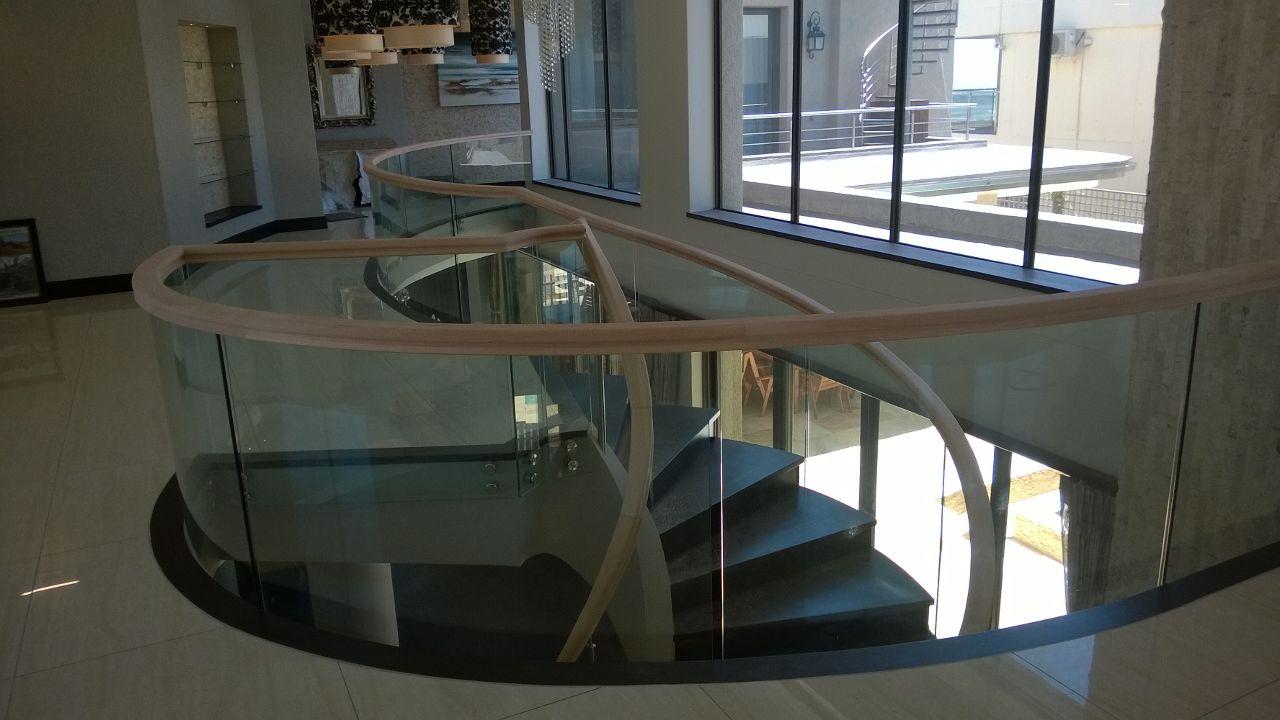 Frameless glass balustrade with handmade wooden handrail, Cape Town