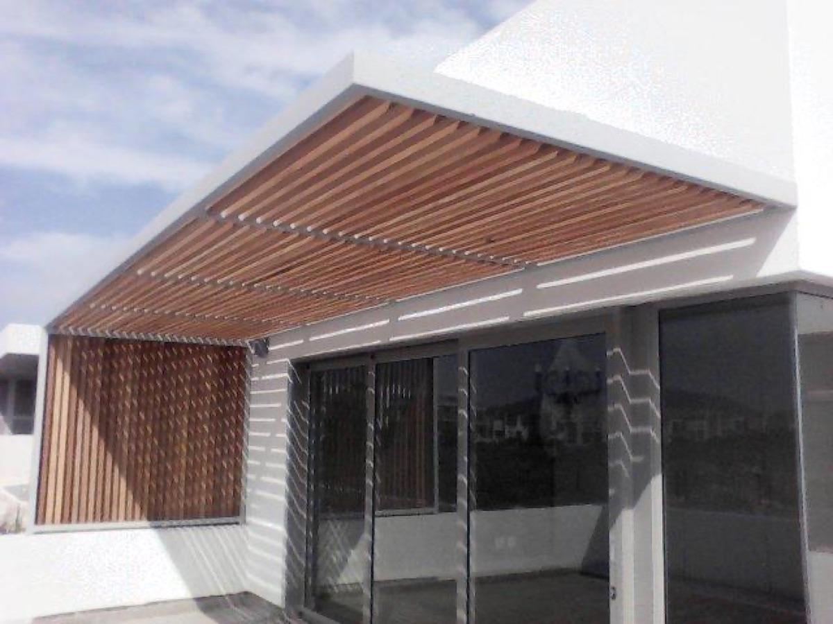 Timber screen and pergola canopy by Sterianos