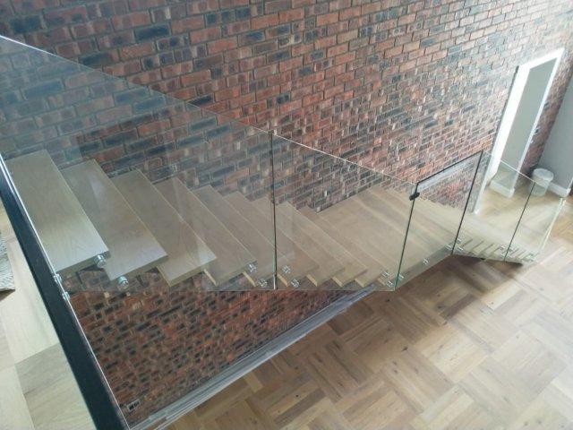 Contemporary mild steel staircase with glass balustrades and oak treads, Cape Town